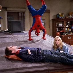 Kramer enters Jerry's apartment crawling upside down on the roof dressed as Spiderman in a TV episode of Sienfeld. George has fainted in shock, and Elaine just doesn't care.