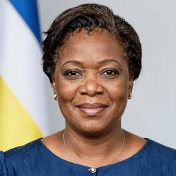 head and shoulders portrait photo of the first lady of the Democratic Republic of East Melavia, full color magazine article by Time (2005)