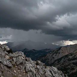 storm clouds rolling in over the rocky mountains by piranesi