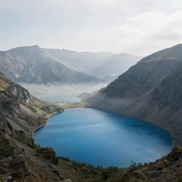 wide angle of a mountains landscape with a blue lake, mist, birds in the sky, ultra detailed matte painting by christophe vacher, matte painting, ultra detailed