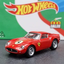 3 5 mm photo of red 1 9 5 2 ferrari 5 0 0 f 2, hot wheels model with italy field as background, very high detail, epic cinematic, epic lighting