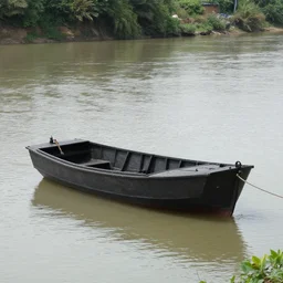 An iron ship in a river::iron-plated::looks like a sunfish boat::photo