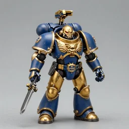 a warhammer 4 0 k space marine painted blue and gold