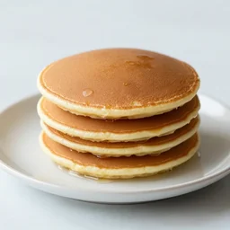 Space themed pancake stack on a plate, f3.2, 50mm