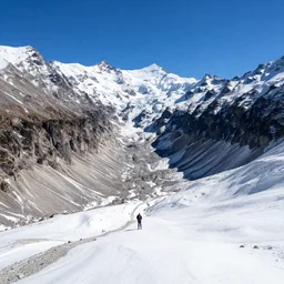 alpine glacial valley view to the higher peaks by tyler eldin