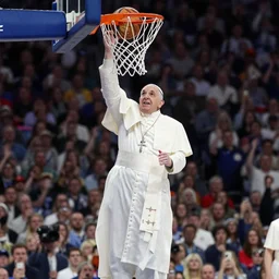pope Francis makes a dunk in the court