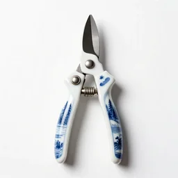 porcelain pruning shears, commercial catalog photo, isolated on a pure white background, centered, entire object in frame, sharp focus, soft studio lighting
