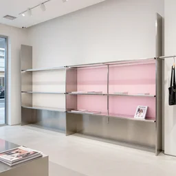 retail store, minimal, stainless steel and color glass, feminine, frame magazine, archidaily