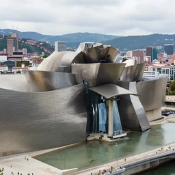 a photo facing the guggenheim museum in bilbao, drone photography, national geographic photo, majestic