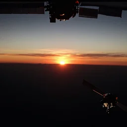 a view of a sunset from low earth orbit, the black void of outer space is visible, photograph, space, cinematic, 4 k, detailed, satellite imagery, beautiful view