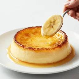 john mayer eating a banana creme brulee, food photography, banana with creme brulee