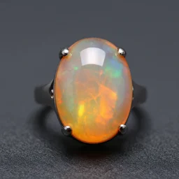 solid fire opal carved into a ring