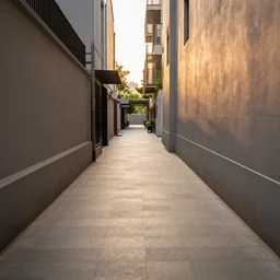 sidewalk view of highly - developed city, alleyway, golden hour