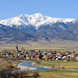 town on the plains, spring, river, snow capped mountains in the background, d & d, by greg rutkowski