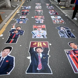 beijing photograph cutouts of chinese protesters laying flat litter the streets of beijing, hyperreal - h 6 4 0