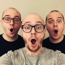selfie of 3 0 - year old bald man with glasses and sparse beard, mouth wide open, surprise, 2 0 1 5