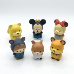 product photograph of cute vintage disney figurines, popular, collectible, toys figures, cute, kawaii, toys, white background,