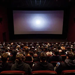 1 9 5 0's movie theatre, full audience all wearing vr headsets. image taken at front of theatre looking towards the crowd. dark only light coming from the screen. audience illuminated