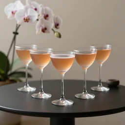 5 5 mm photo of best long cocktail on a zen minimalist table with elegant orchids in the background. highly detailed 8 k. intricate. lifelike. soft light,