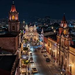 downtown oaxaca, city at night, in the style of disco elysium, j. c. leyendecker, greg rutkowski, artem