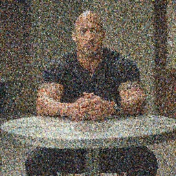 film still of Dwayne Johnson as Doctor Evil sitting at the round metal table from Austin Powers