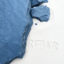 mix of cool blue slate angular rubble and pale white sand with etchings of