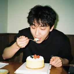 a cctv film of a man eating a cake