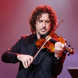 singer gustavo cerati playing violin