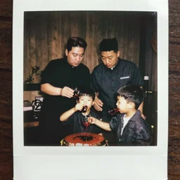 kim jong creepy family, driking blood of his son, polaroid