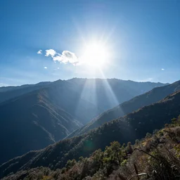mountain scene blue sky with god sunrays 4k