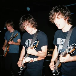 joel sternfeld photo of an anime metal band, direct flash photography at night, film grain
