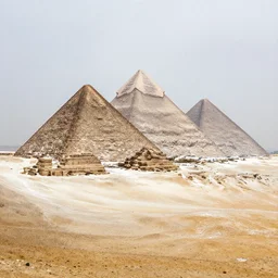 an award winning landscape photo of the pyramids of Giza under heavy snow