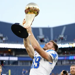 detroit lions jared goff lifts up the lombardi trophy, confetti, 8 k sports photography