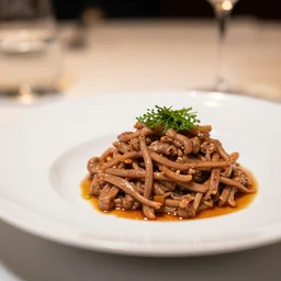 wet dog food on a plate, gourmet michelin restaurant, food photography, DOF, F1.4