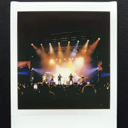 80s polaroid colour flash photograph of Iron Maiden concert