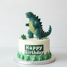 birthday cake with frosting of Godzilla decor