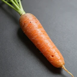 a carrot covered in human skin with a hole in the tip