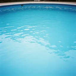 Beautiful 2000s phone-camera, soft Photograph of infinite infinite infinite empty pool