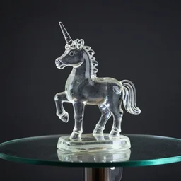a glass statue of a unicorn on a glass table, dramatic lighting, professional photo