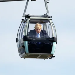 photo of boris johnson stuck below a gondola lift, award - winning