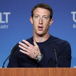 mark zuckerberg's skin peeling off to reveal wires and metal at a press conference