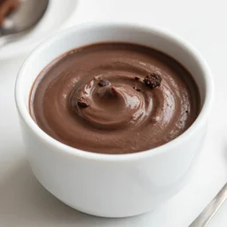 a fine cup full of chocolate pudding