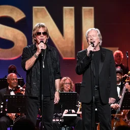full band photo with eric clapton and walter white singing, iconic photo, award winning photograph, snl stage, 1 4 - 2 4 mm f / 2. 8