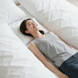 a photograph of a happy woman lying down on her back. she is surrounded by piles and piles of sheets of paper. the papers have art by artgerm and greg rutkowski on them.