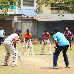 four tamil friends playing a game of cricket, on an indian street, photorealistic, 4 k