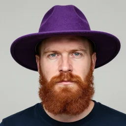 man with a ginger beard wearing a violet hat