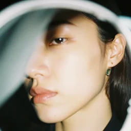realistic photoshooting for a new acne studio lookbook, color film photography, close up, interesting perspective, photo of a woman, photo in style of tyler mitchell, 3 5 mm, vetements, balenciaga, commes des garcon