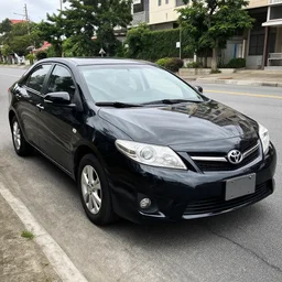 black 2011 toyota Corolla SE in a wreck