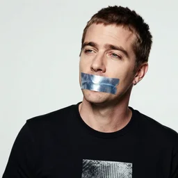corey taylor with duct tape on his mouth