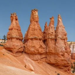 group of rocks in a desert, a detailed matte painting by thierry bisch, pinterest, land art, national geographic photo, bryce 3 d